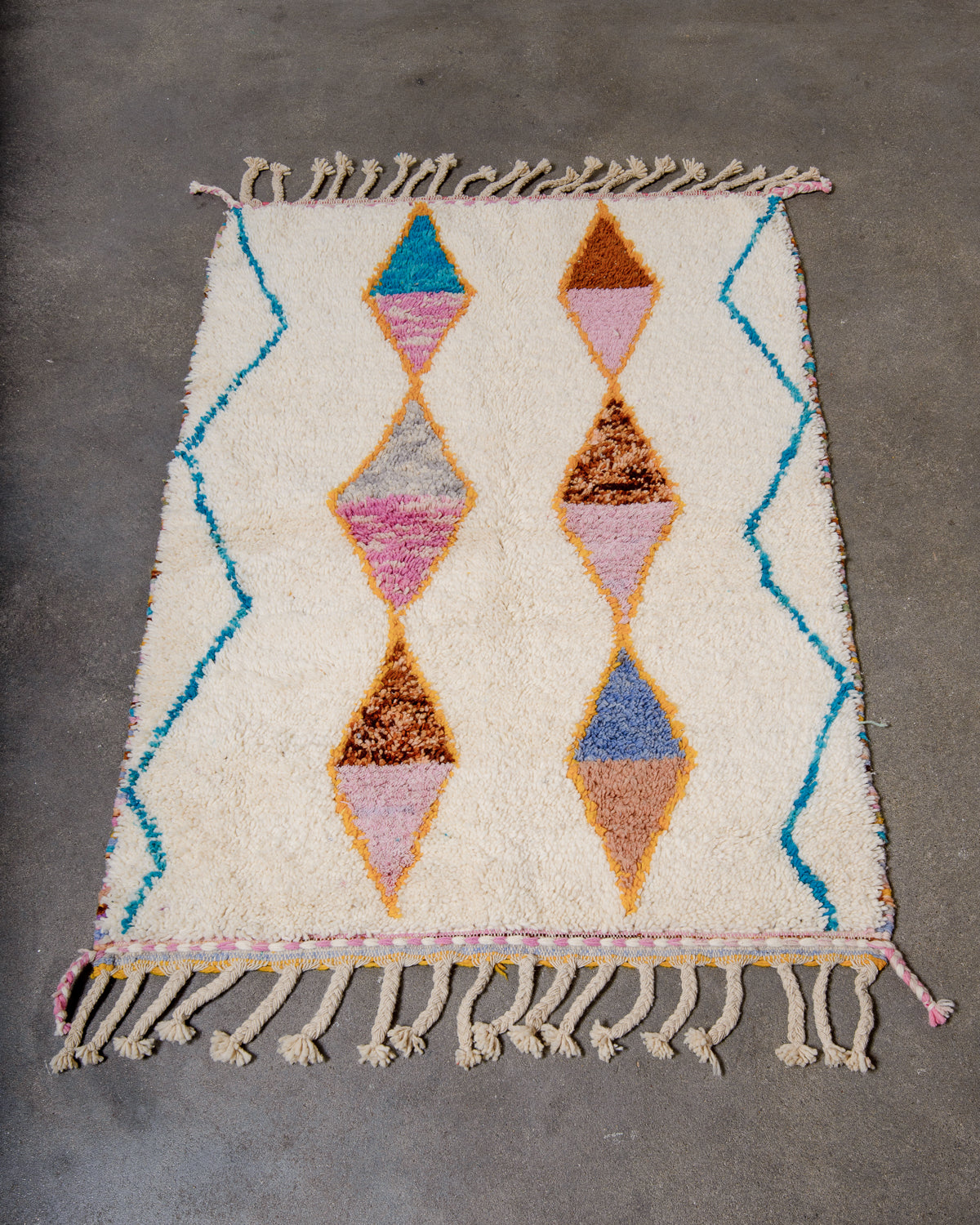 Modern, designer, handcrafted Berber rug from Morocco. Beniourain carpet with beautiful colours and patterns and fluffy wool texture.